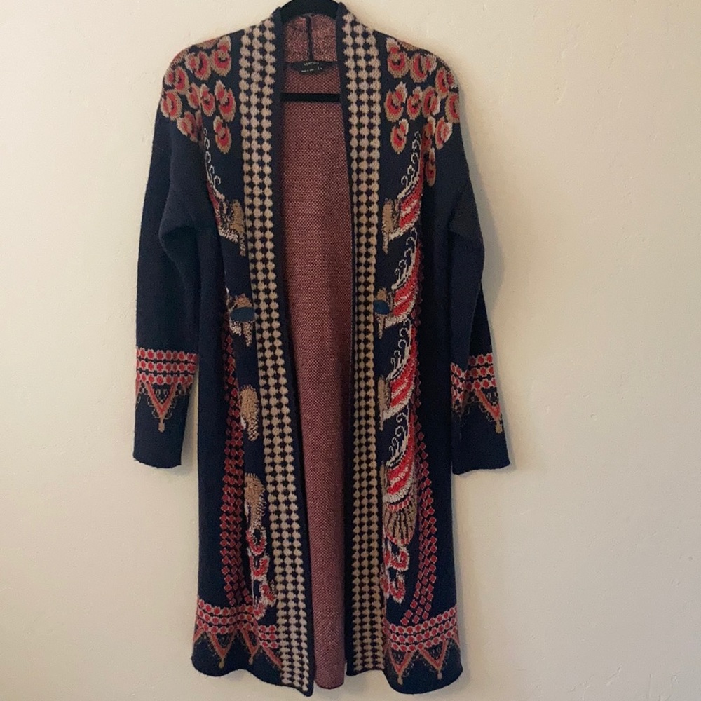 Vertigo brand. Dark blue with red and cream design. Size Medium
